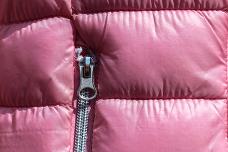 Detailed close up view on samples of cloth and fabrics in different colors found at a fabrics market.の写真素材
