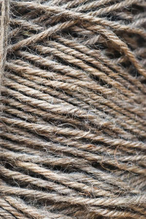 Stranded threads. A tangle of yarn. Entangled confusing thread on a roll