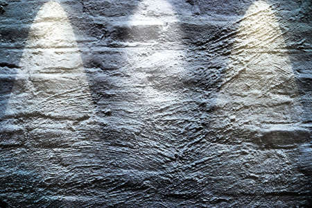 Close up view on concrete wall textures with three spotlights in high resolutionの写真素材