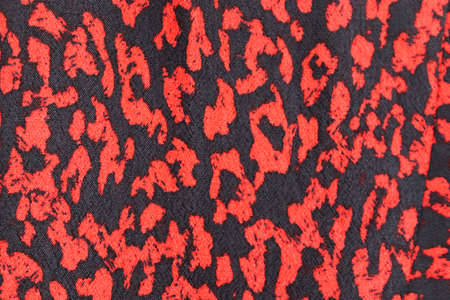 Detailed close up view on samples of cloth and fabrics in different colors found at a fabrics...