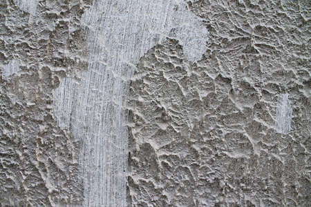 Detailed view on aged concrete walls fronm different modern and hostorical buildings with cracks and a lot of structure in high resolutionの写真素材