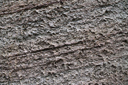 Detailed view on aged concrete walls fronm different modern and hostorical buildings with cracks and a lot of structure in high resolutionの写真素材