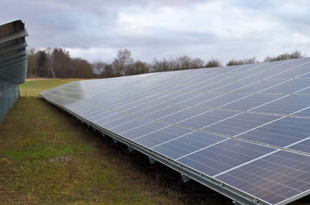 Generating clean energy with solar modules in a big park in northern Europe.