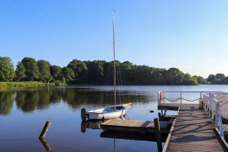 Beautiful sunset landscape at a small lake in northern Europe.