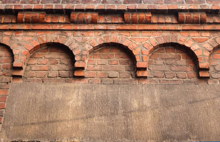 Old red rick wall. Texture of old weathered brick wall panoramic background.の写真素材