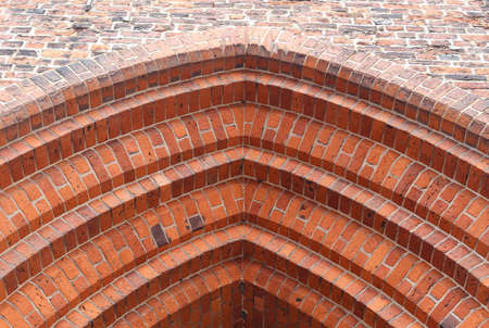 Old red rick wall. Texture of old weathered brick wall panoramic background.の写真素材