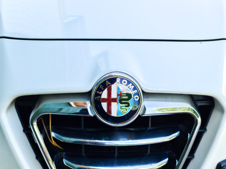 Kiel, Germany - 13. August 2021: Kiel, Germany - 13. August 2021: Closeup of the Alfa Romeo logo on a new car frontのeditorial素材