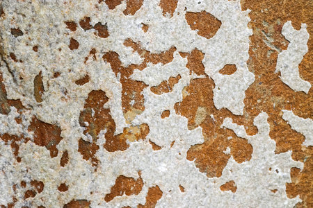 Detailed close up view on aged concrete walls with cracks and lots of structured details