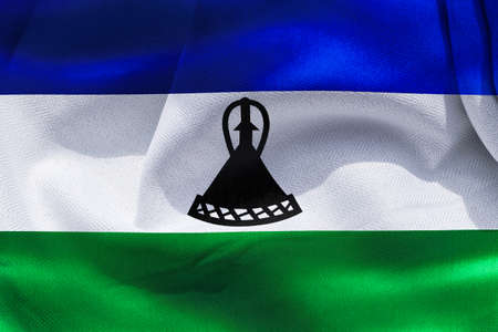 Lesotho flag - realistic waving fabric flagの写真素材