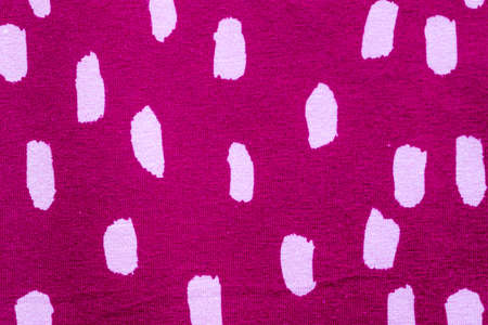 Detailed close up view on samples of cloth and fabrics in different colors found at a fabrics...