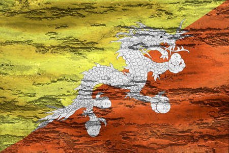 Bhutan flag - realistic waving fabric flagの写真素材