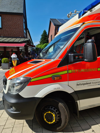 Bordesholm, Germany - 1. July 2022: A German ambulance parked in the center of Bordesholm