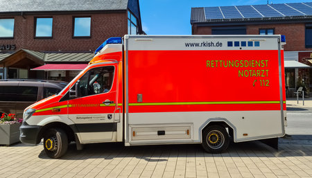 Bordesholm, Germany - 1. July 2022: A German ambulance parked in the center of Bordesholmのeditorial素材
