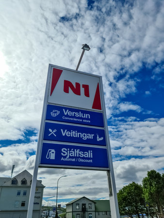 Reykjavik, Iceland - 15. July 2022: An Icelandic petrol station of the company N1 - company logos and petrol prices in Icelandic landscapeのeditorial素材