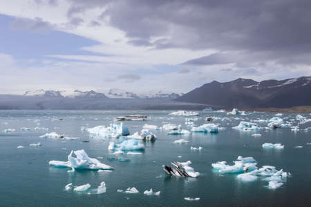 Iceland, Jokulsarlon Lagoon, Turquoise icebergs floating in Glacier Lagoon on Iceland