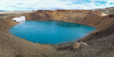 The crystal clear deep blue lake Krafla on Icelandの写真素材