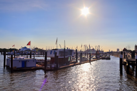 Hamburg, Germany, 27 August 2022, Beautiful view at the port of Hamburg with ships and people on a sunny summer dayのeditorial素材