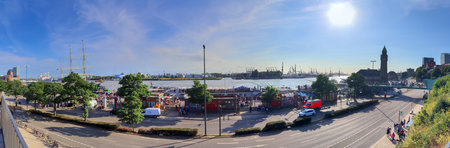 Hamburg, Germany, 27 August 2022, Beautiful view at the port of Hamburg with ships and people on a sunny summer dayのeditorial素材