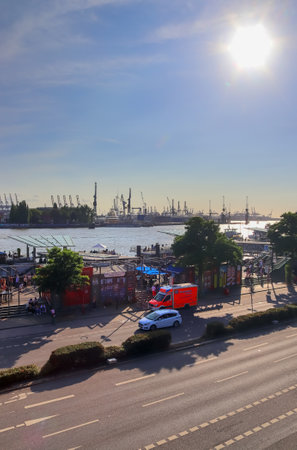 Hamburg, Germany, 27 August 2022, Beautiful view at the port of Hamburg with ships and people on a sunny summer dayのeditorial素材