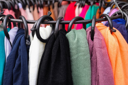 Samples of cloth and fabrics in different colors found at a fabrics market.の写真素材