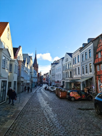 Flensburg, Germany - 18 February 2023: Old architecture in the streets of Flensburg on a sunny dayのeditorial素材