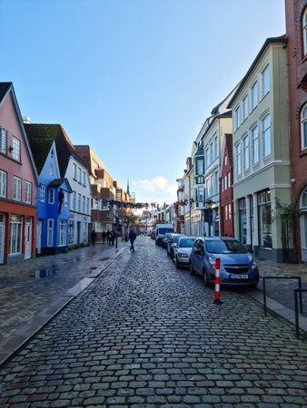 Flensburg, Germany - 18 February 2023: Old architecture in the streets of Flensburg on a sunny day