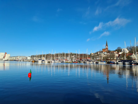 Flensburg, Germany - 18 February 2023: View of the historic harbour of Flensburg in fine weather.のeditorial素材