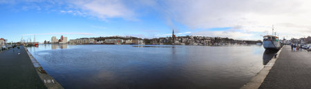 Flensburg, Germany - 18 February 2023: View of the historic harbour of Flensburg in fine weather.