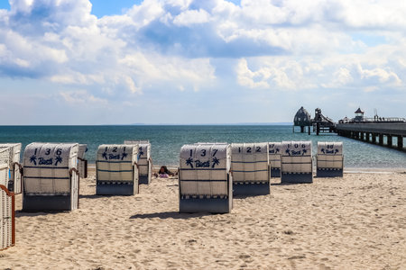 Groemitz, Germany - 05. April 2023: On the beach of Groemitz in northern Germany in sunny weatherのeditorial素材