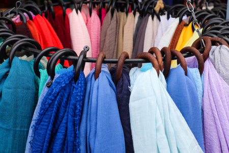 Samples of cloth and fabrics in different colors found at a fabrics market.の写真素材