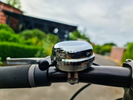Close-up view of a bicycle bell on a handlebarの写真素材