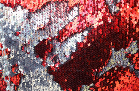 Samples of cloth and fabrics in different colors found at a fabrics market.