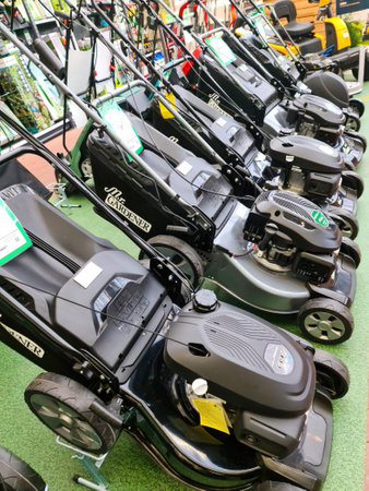 Kiel, Germany - 27. September 2023: Several lawn mowers brand Mister Gardener for sale