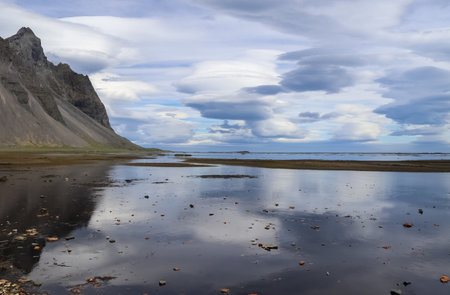 Spectacular UFO clouds in the sky over Iceland - Altocumulus Lenticularisの写真素材