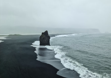 Basalt rock formations on the famous black beach in Iceland