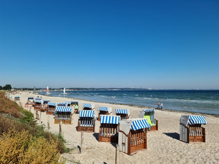 Scharbeutz, Germany 21. September 2024: Beach chairs for rent on the sandy beach of Scharbeutz on a sunny dayのeditorial素材
