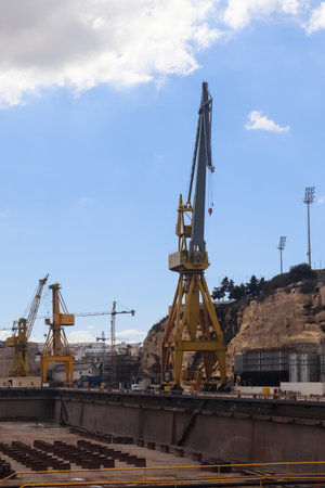 Valletta, Malta: 01. October 2024: Ships and cranes at the docks of the industrial port of Valletta in Maltaのeditorial素材