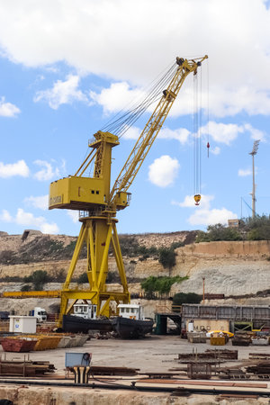 Valletta, Malta: 01. October 2024: Ships and cranes at the docks of the industrial port of Valletta in Maltaのeditorial素材