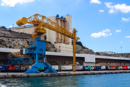 Valletta, Malta: 01. October 2024: Ships and cranes at the docks of the industrial port of Valletta in Maltaのeditorial素材