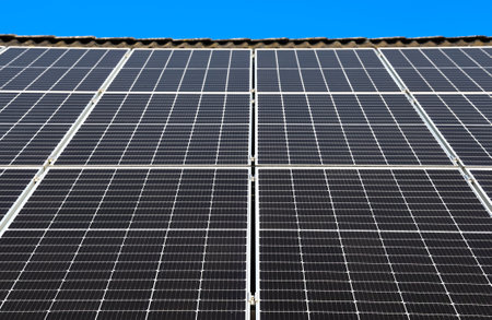 Solar panel system absorbing sunlight on a rooftop, generating clean and sustainable electricity