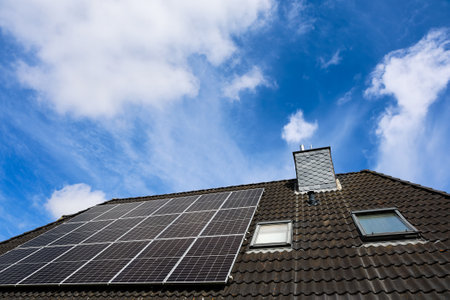 Photovoltaic panels installed on a rooftop are providing clean and sustainable energy, contributing...