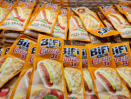 Kiel, Germany - 24. November 2025: Bifi Carazza pizza snacks displayed in a supermarket, showing individually packaged processed food items for quick consumptionのeditorial素材