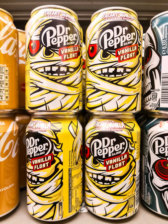 Kiel, Germany - 27. December 2025: Dr Pepper Vanilla Float special edition cans featuring a spooky...