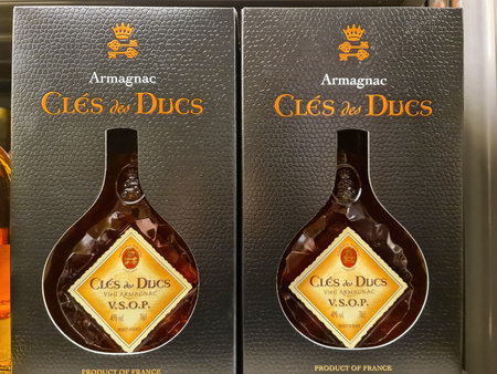 Kiel, Germany - 27. December 2025: Two ClÃ©s des Ducs Armagnac V.S.O.P. Bottles with distinctive...