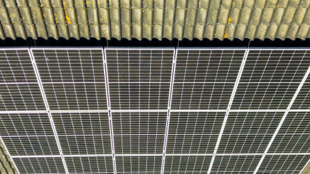 Solar panels on a corrugated roof generating renewable energy