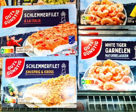Kiel, Germany - 07. January 2026: Frozen food items, including fish fillets and shrimps, from Gut & GÃ¼nstig brand on displayのeditorial素材