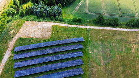 Rows of solar panels converting sunlight into clean energy in a German rural landscape