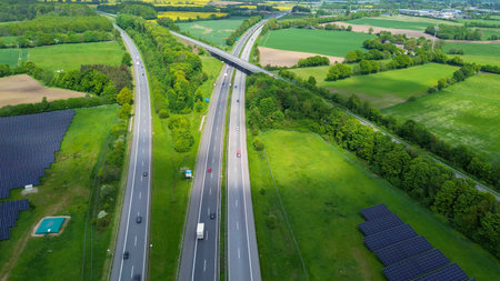 Elevated view showing modern infrastructure and renewable energy integration in a rural landscape
