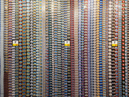 Hamburg, Germany - 05. March 2026: Hamburg souvenir magnets displayed in rows on a retail rack for...