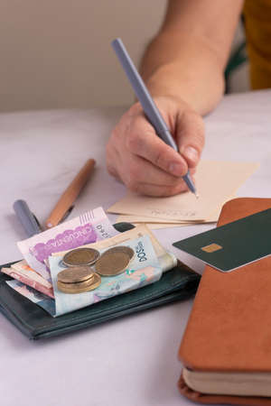 man hands doing financial accounts